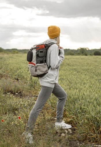 side-view-female-with-backpack